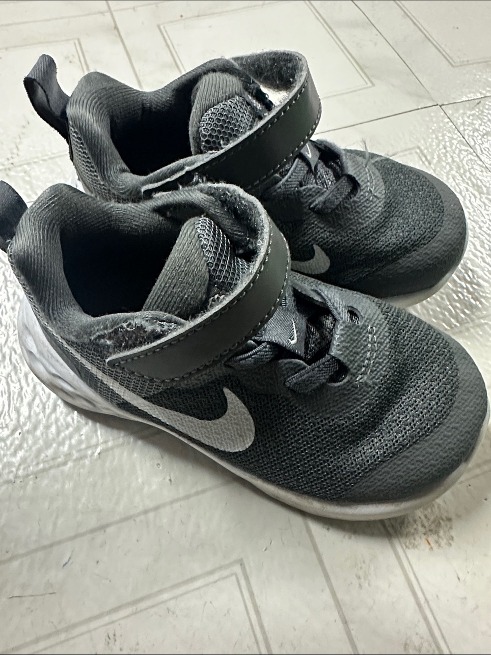 Nike Kids' Gray Athletic Sneakers with White Swoosh
